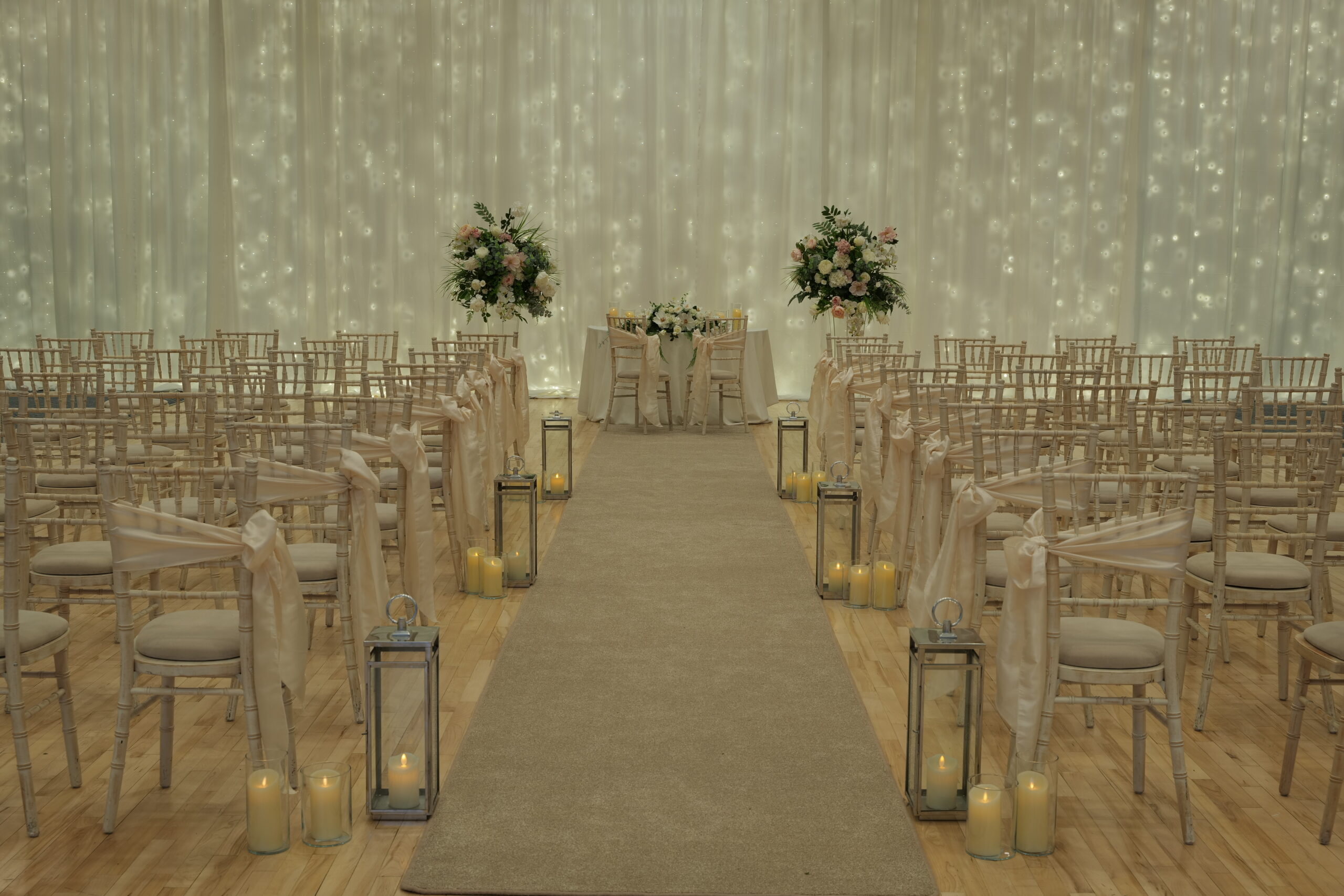 Civil-Ceremony-Aisle-Pairs-Of-Candles-In-Vases-With-Chrome-Floor-Lanterns-Ivory-Carpet-Fairways-Hotel-Dundalk-Co-Louth
