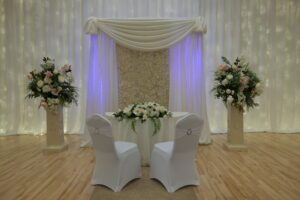 Civil-Ceremony-Ivory-Floral-Wall-Ivory-Stands-With-Floral-Arrangements-Fairways-Hotel-Dundalk-Co-Louth